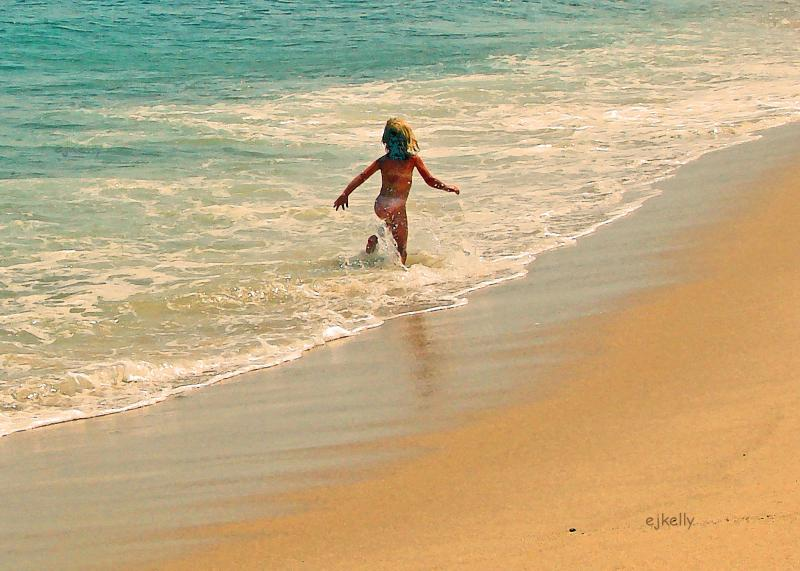 Child Running in Ocean